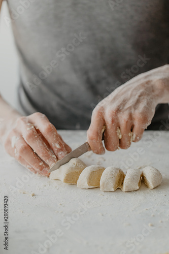 Chef cook making traditional dough