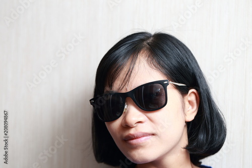 the woman with sunglasses