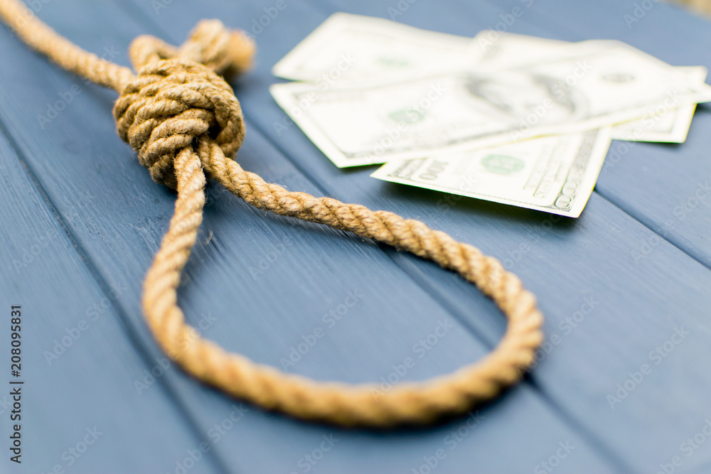 Gallows, rope loop. The concept of suicide because of money.