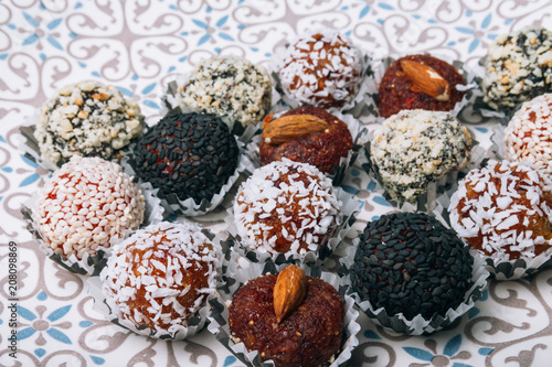 sweets from dried fruits with nuts and sesame seeds