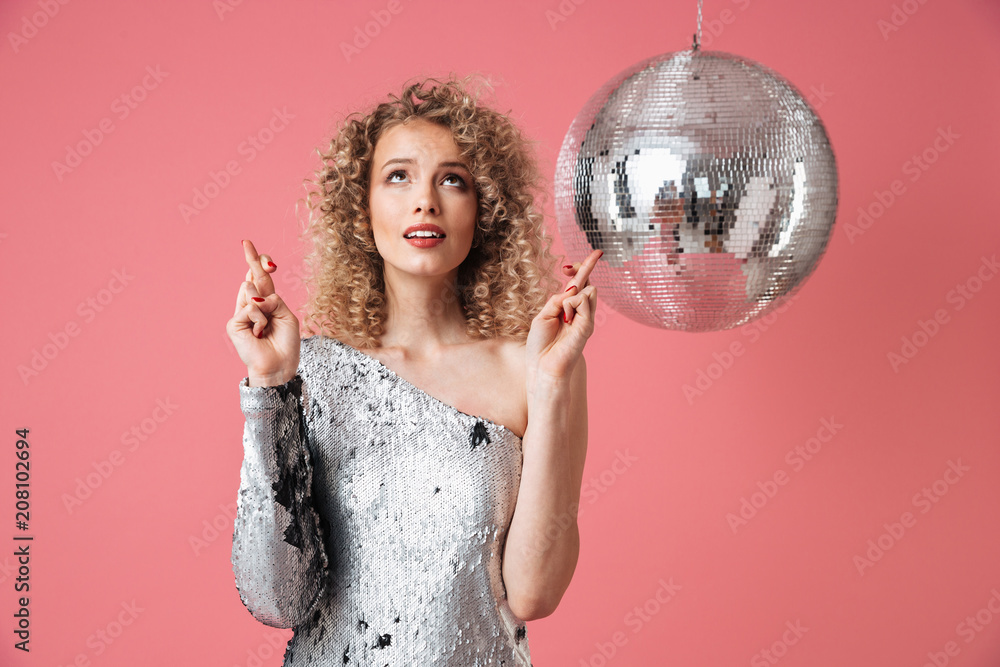 Naklejka premium Portrait of a beautiful woman in shiny dress