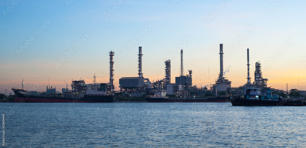 Bankrajao , Samuthprakarn , Thailand - December 02, 2017:The boat is sailing through the oil refinery at Chao Phraya River, Samuthprakarn,Thailand, Oil refinery,