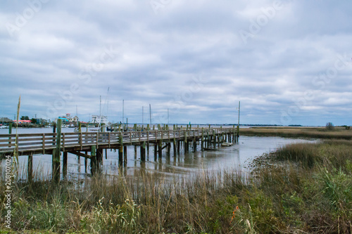 Wallpaper Mural Sunset Beach North Carolina - View of the fishing village on a cloudy day Torontodigital.ca