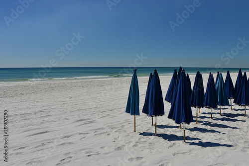 White Sand with Navy Umbrellas