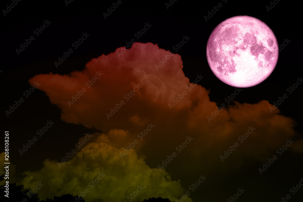 Obraz premium full pink moon and light blue heap cloud on colorful night sky