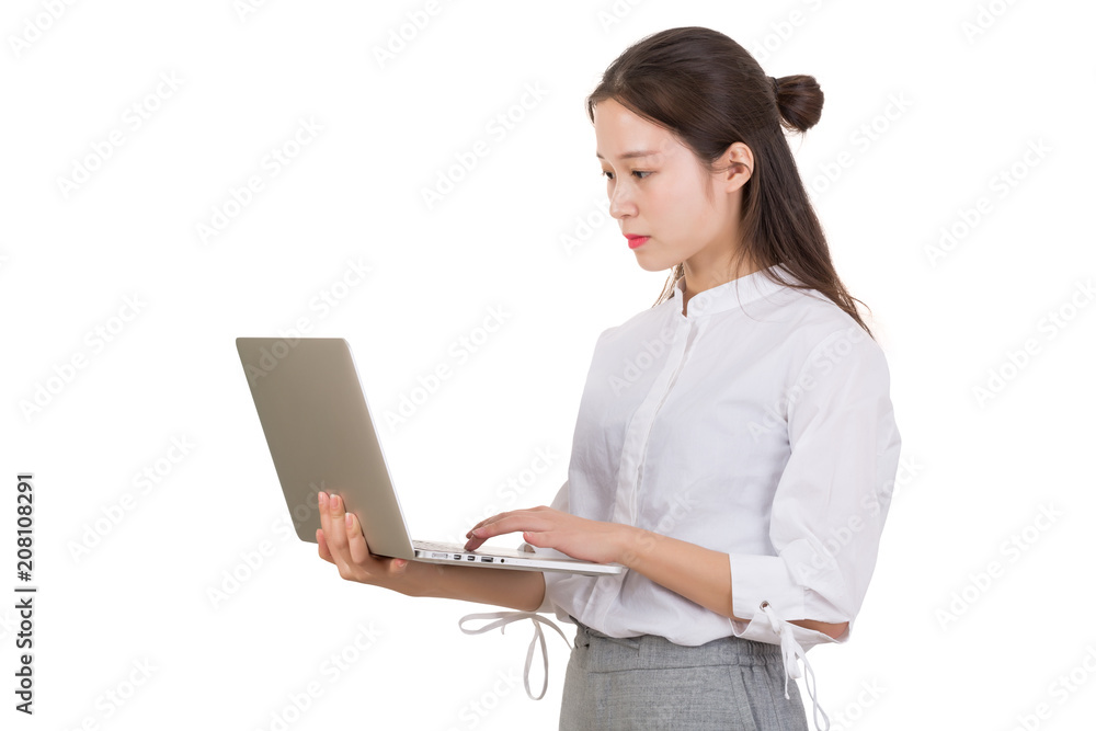 Beautiful young woman with laptop computer. Standing over white background. Beautiful young woman with laptop computer. Standing over white background.