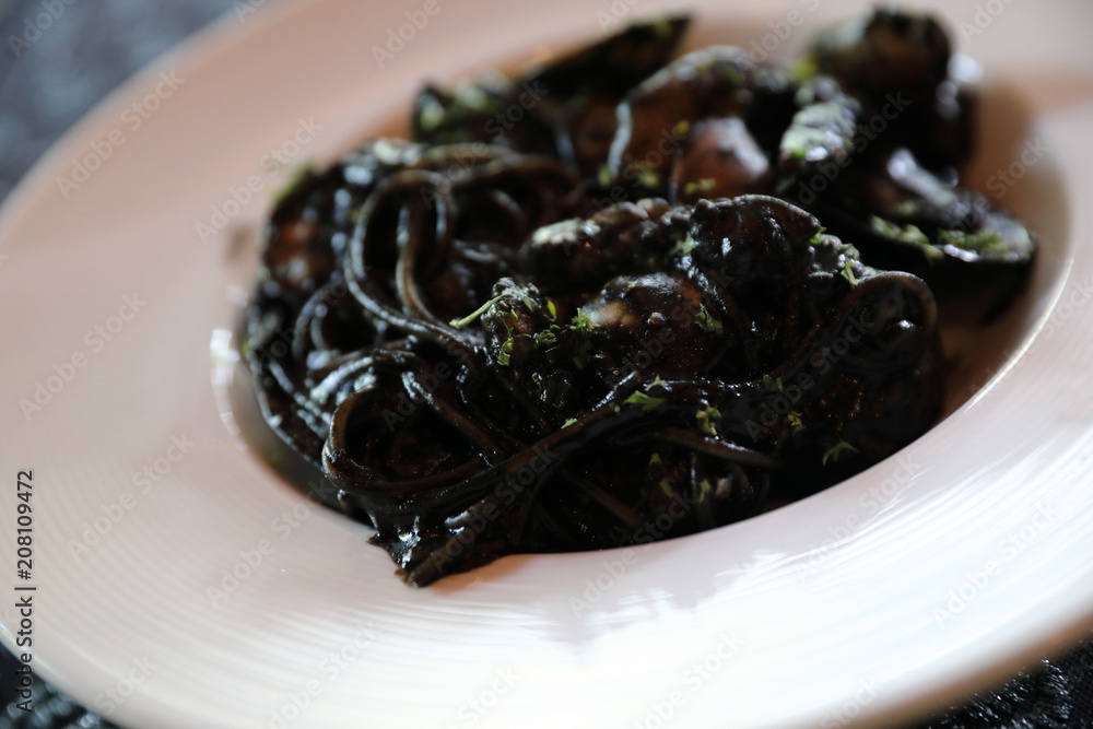 Spaghetti seafood with squid ink , Italian food Spaghetti seafood with squid ink , Italian food