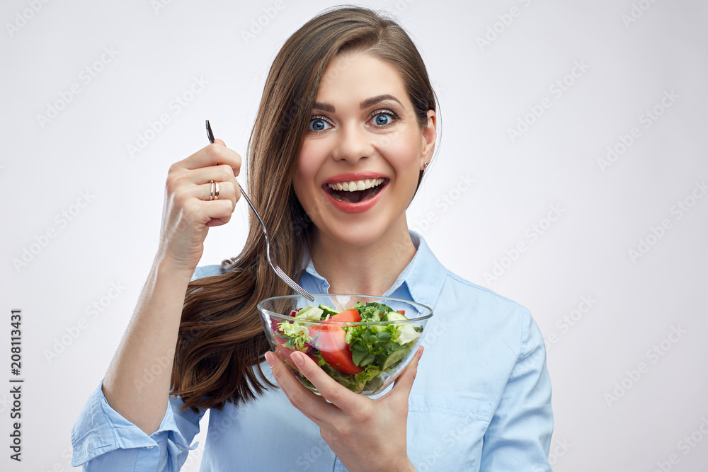 Happy woman with big toothy smile holding salad bowl. Happy woman with big toothy smile holding salad bowl.