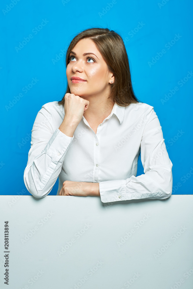 Woman wearing white shirt, studio portrait with empty banner bel Woman wearing white shirt, studio portrait with empty banner bel