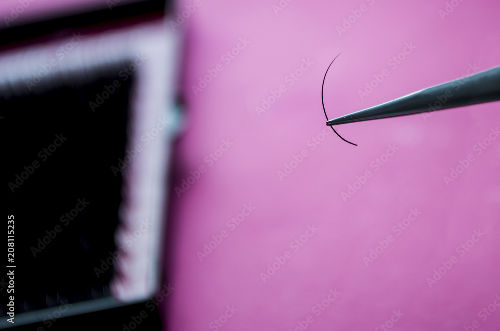 tweezers ans set Eyelash for extension on pink background tweezers ans set Eyelash for extension on pink background