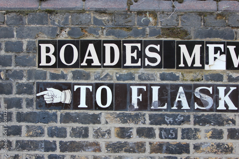decorative tiles, writing, wall, street signs, London, U.K decorative tiles, writing, wall, street signs, London, U.K