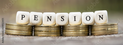 Web banner of pension savings plan concept - money coins with letters photo