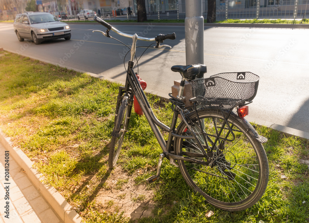 Parked bike in summer sunlight