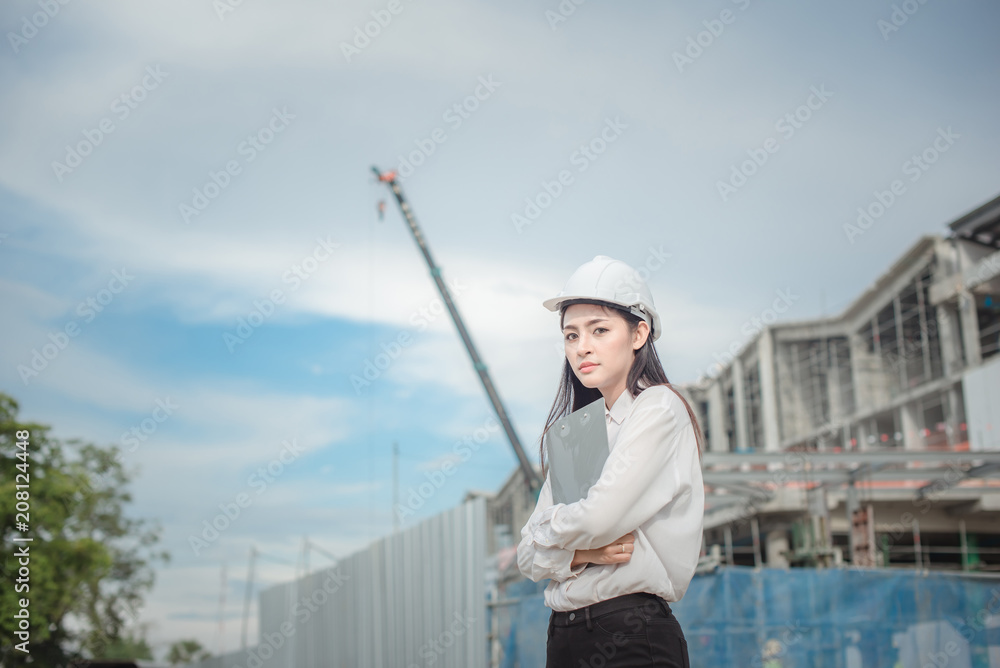 Asian women worker and engineer electrician work safety control at power plant energy industry Asian women worker and engineer electrician work safety control at power plant energy industry