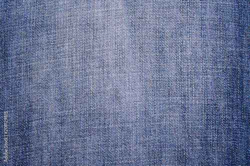 Denim fabric close-up. Background. Blue colour.