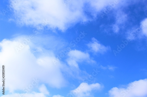 Beautiful blue sky and white cumulus clouds. Background. Landscape.