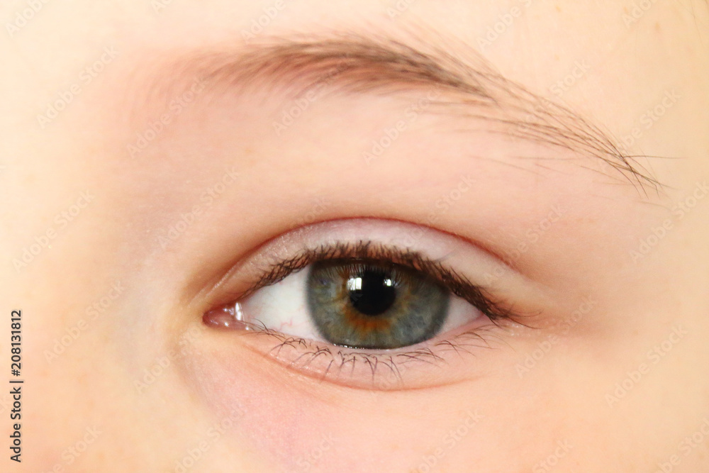 Beautiful eye girl close-up. Background. A child's view. Beautiful eye girl close-up. Background. A child's view.