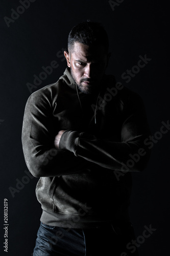 Lifestyle for active and healthy man. Macho with beard wear casual clothes. Bearded man with hands folded in sweatshirt. Fashion model in stylish sportswear. Sport fashion and style, vintage filter