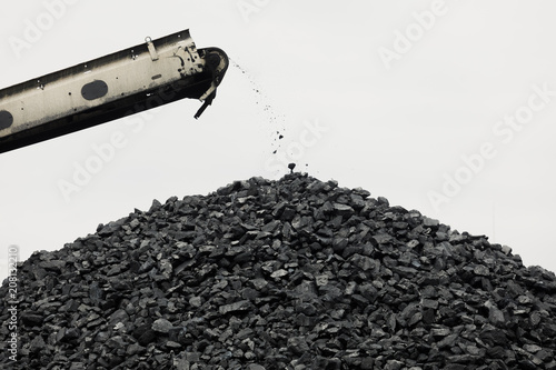 Coal stacker and Coal Reclaimer are mining machinery, or mining equipment in the mining industry that large or huge machine used in bulk material handling in stockpile as the Coal Production. photo