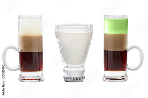 A set of alcoholic shots with liqueur and absinthe.