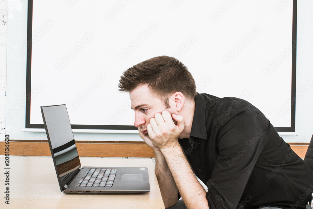Low energy is coffee time for office worker on laptop. Low energy is coffee time for office worker on laptop.