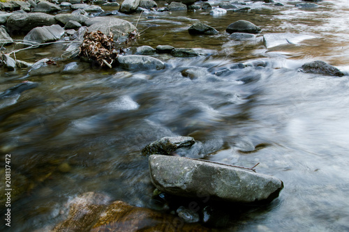 Running water, shallow river, stones