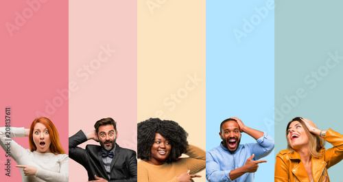 Cool group of people, woman and man pointing away side with finger