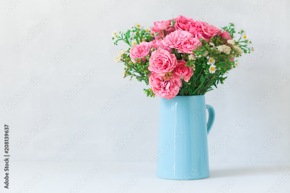 Beautiful bouquet of pink roses in vase