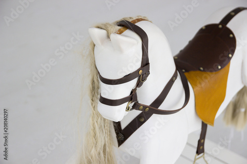 A rocking horse. Children's toy horse. White toy horse. photo