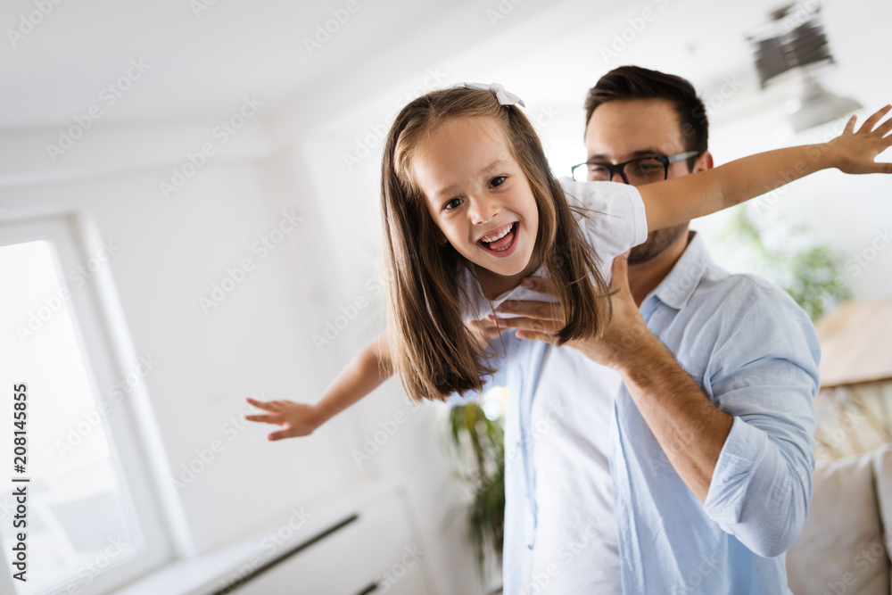 Happy family having fun time at home Happy family having fun time at home