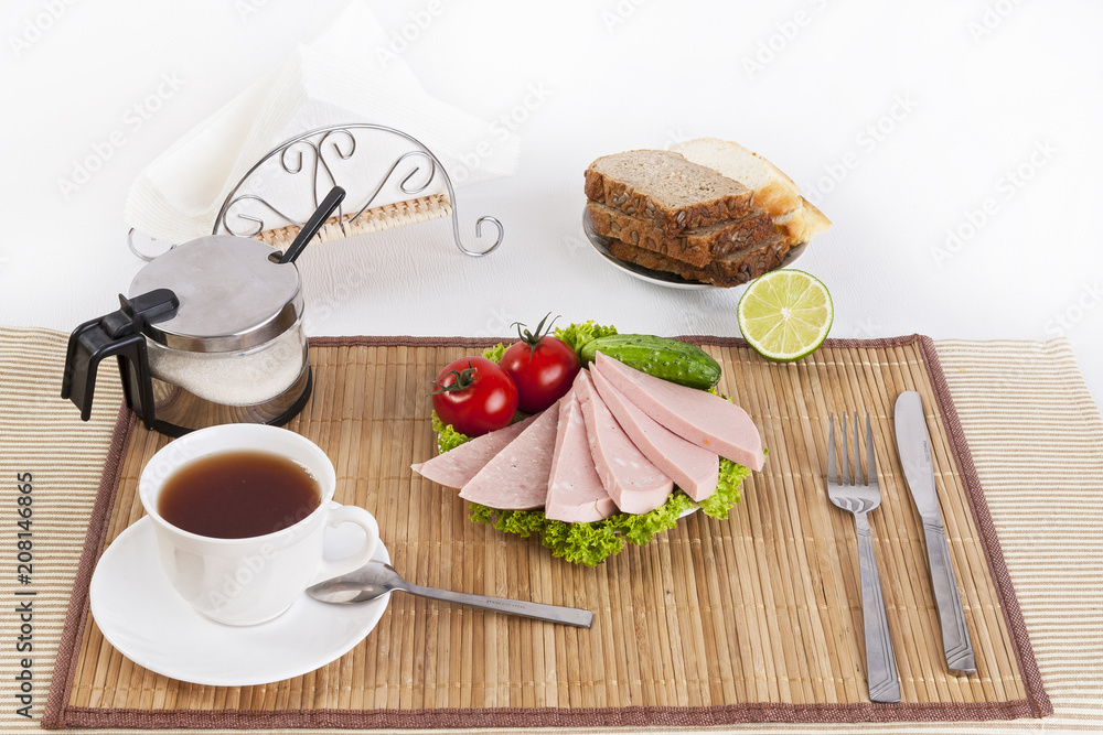 Sausage boiled with greens, tomatoes and cucumbers. Served with black or white bread. This is a good breakfast at the beginning of the day. Sausage boiled with greens, tomatoes and cucumbers. Served with black or white bread. This is a good breakfast at the beginning of the day.