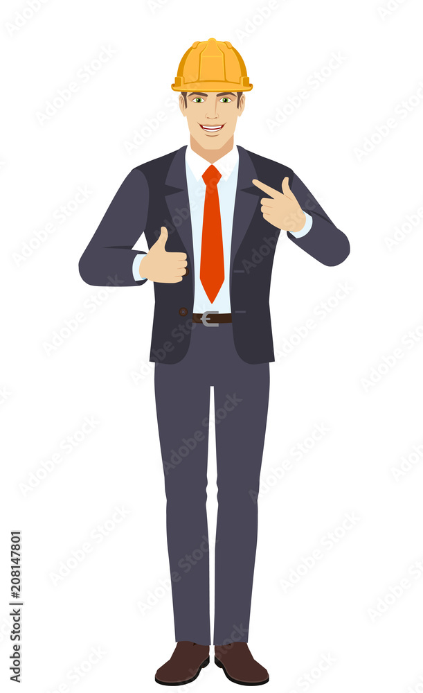 Businessman in construction helmet showing thumb up and pointing the finger at himself Businessman in construction helmet showing thumb up and pointing the finger at himself