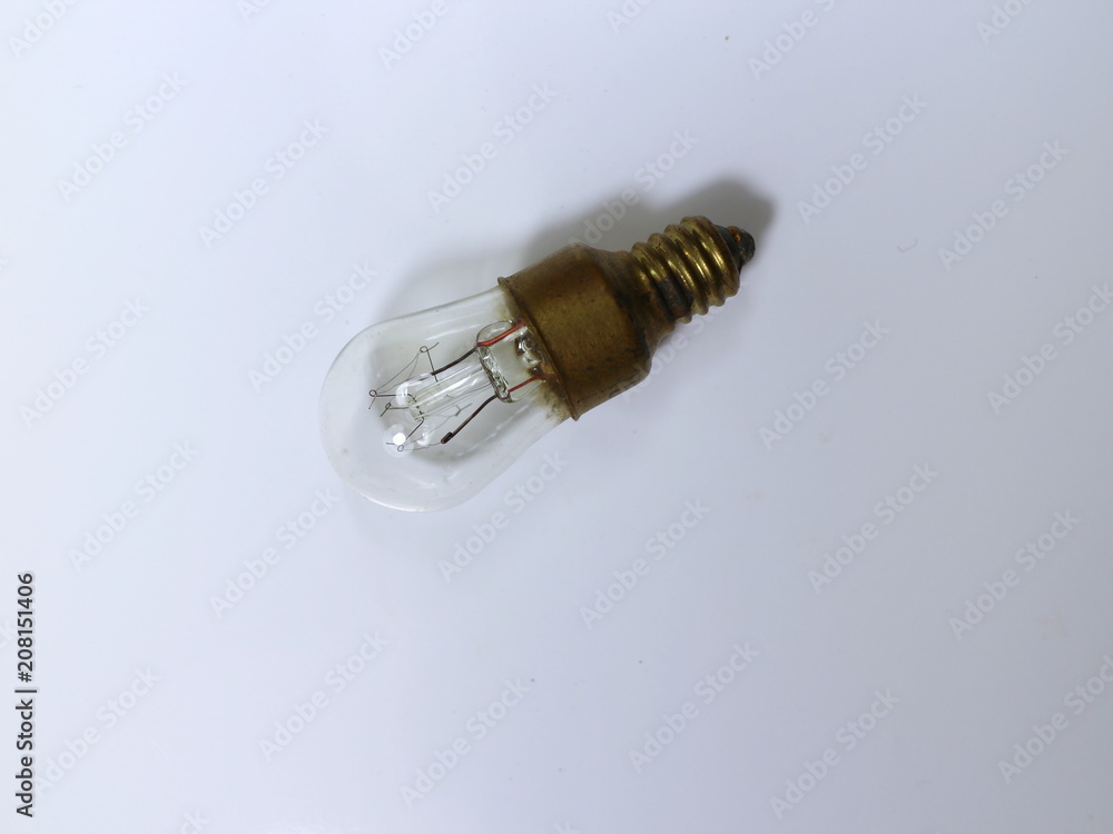 electric incandescent light on white table electric incandescent light on white table