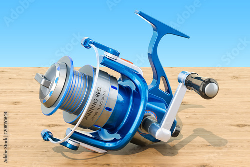 Spinning reel on the wooden table, 3D rendering