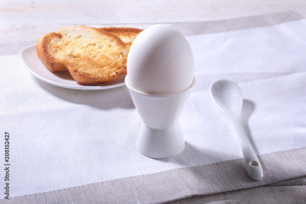 Morning Breakfast set with egg and bread toast on white background. Morning Breakfast set with egg and bread toast on white background.