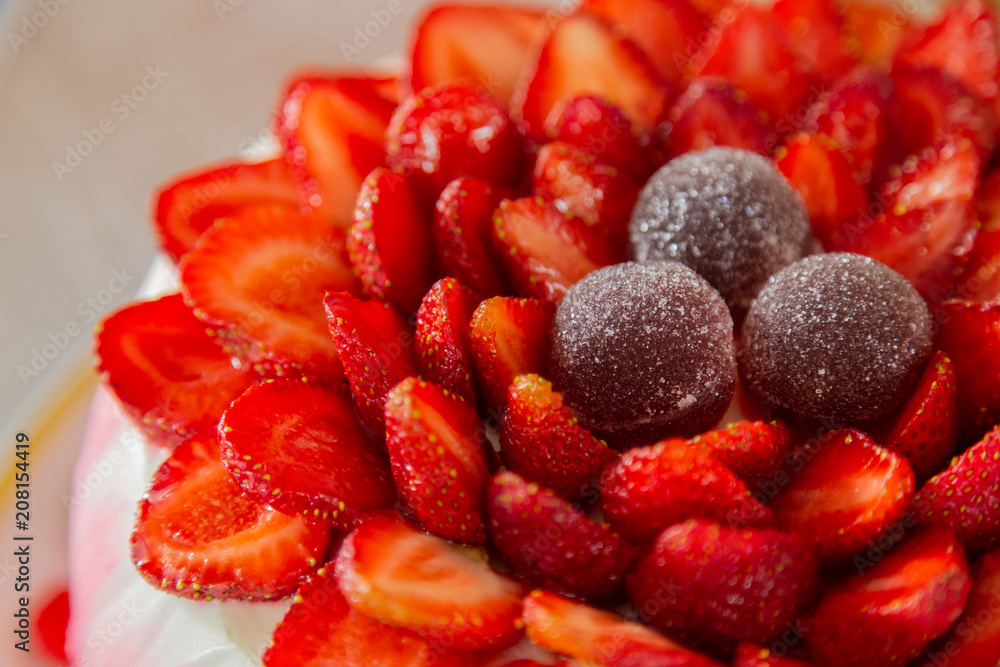 Bright beautiful mouth-watering strawberry cake and cream. Bright beautiful mouth-watering strawberry cake and cream.