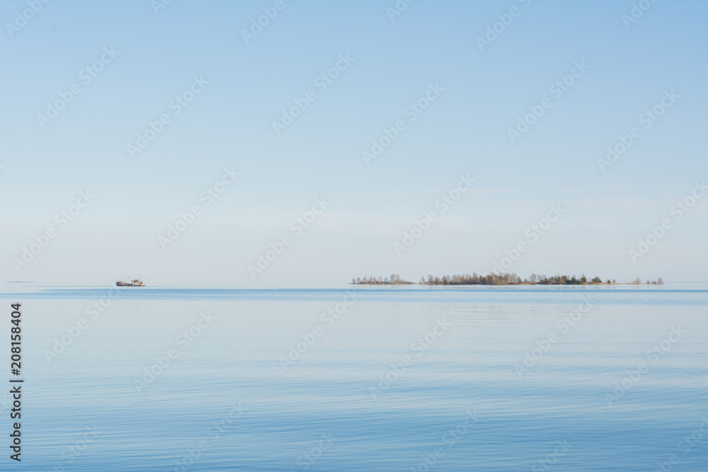 The lake and a ship on the horizon