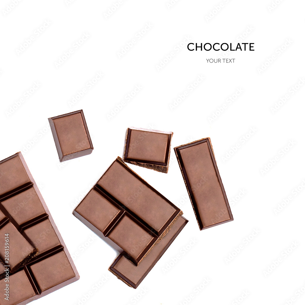 Dark chocolate pieces isolated on white background. Top view Dark chocolate pieces isolated on white background. Top view