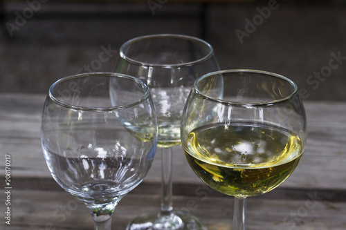 close-up shot of wine glasses under dim light