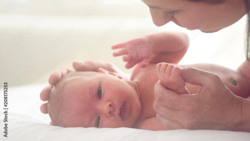 Happy mother and her newborn baby. Slow motion. 3840X2160 4K UHD video footage Happy mother and her newborn baby. Slow motion. 3840X2160 4K UHD video footage