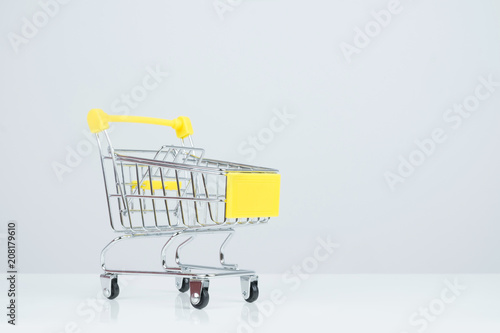 Shopping cart on white background.