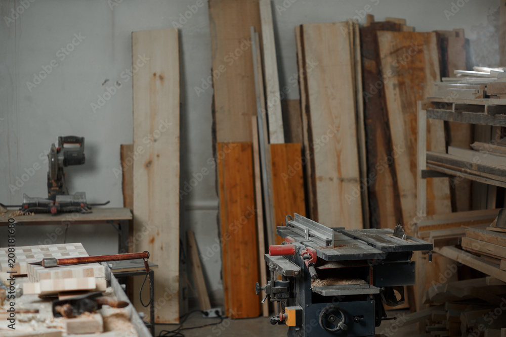 Portrait Male Master carpenter apron in his workshop. Small business