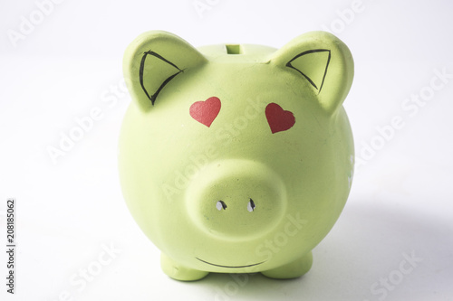 green piggy bank isolated on white background
