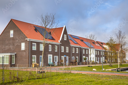 Modern row houses with solar panels photo