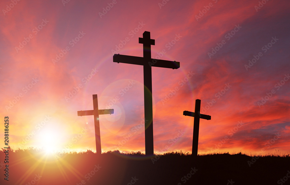 Cross Signifying Crucifixion of Jesus With Sunset Sky and Copy Space. Concept of Christianity and Good Friday or Easter Sunday.