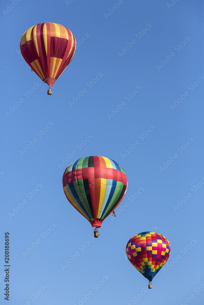 Naklejka premium Hot air balloons flying in the sky