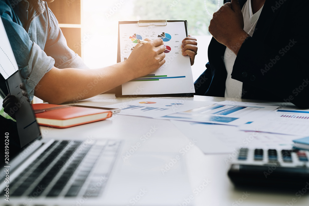 Two Businessman consult and discuss in office. business, tax and account concept. Two Businessman consult and discuss in office. business, tax and account concept.