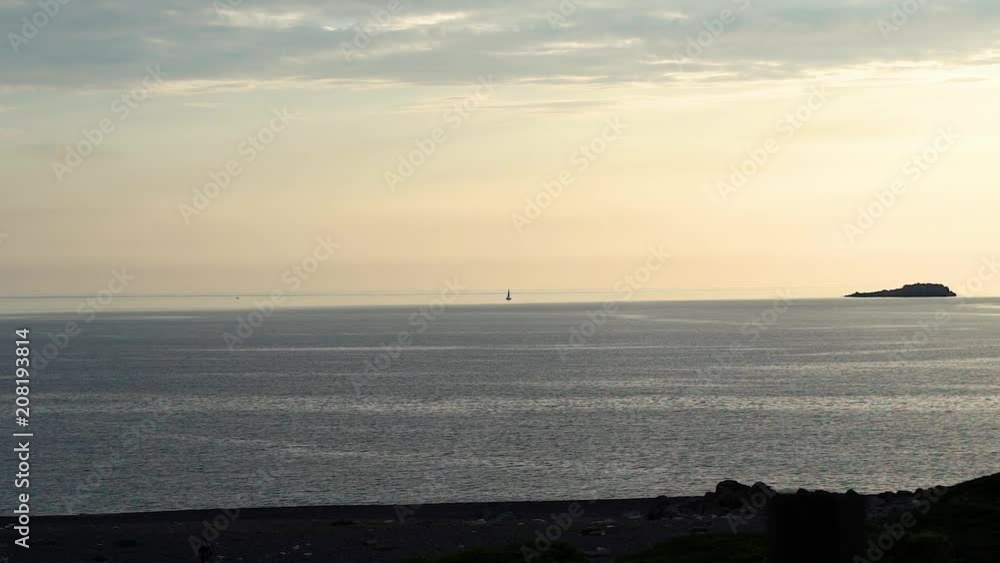 Coastline of Corsica with remote beach water during sunset in slow motion Coastline of Corsica with remote beach water during sunset in slow motion