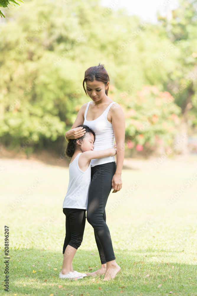 Beautiful Mother And Baby outdoors. Nature. Beauty Mum and her Child playing in Park. Beautiful Mother And Baby outdoors. Nature. Beauty Mum and her Child playing in Park.