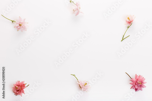 Festive flowers composition on the white background. Overhead top view  flat lay. Copy space. Birthday  Mother s  Valentines  Women s  Wedding Day concept.